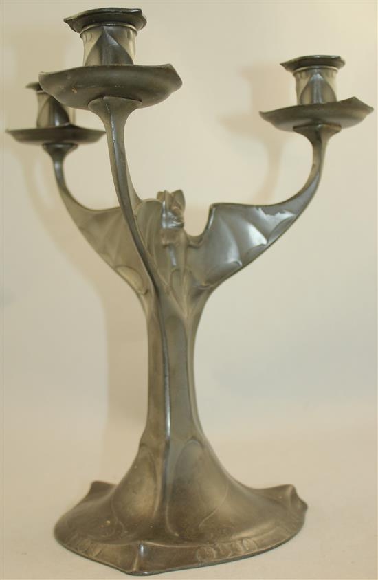 Hugo Levin. A Kayserzinn pewter three branch bat candelabrum, 12.5in.